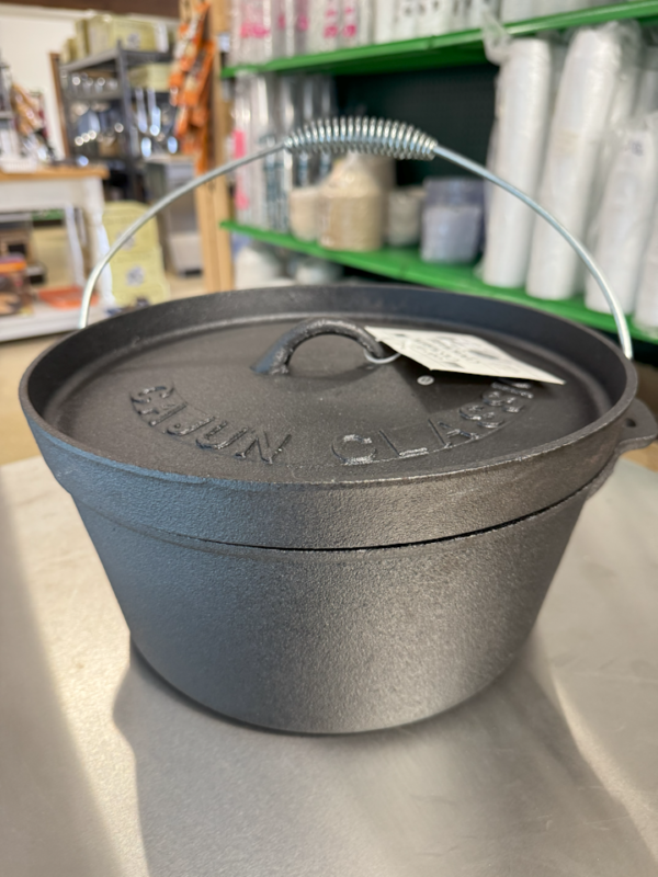 picture of a black cast iron camp pot