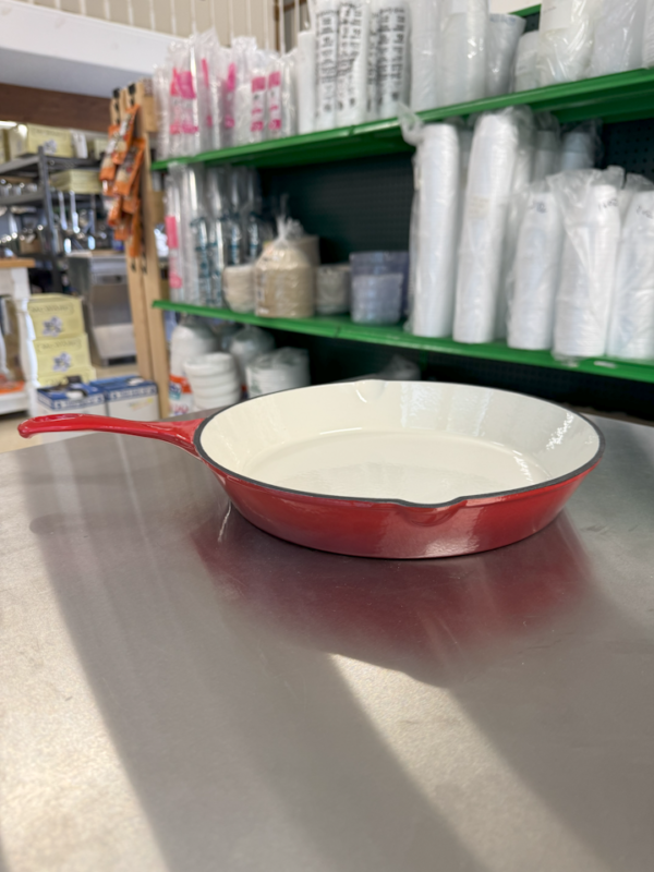 picture of red enamel coated skillet